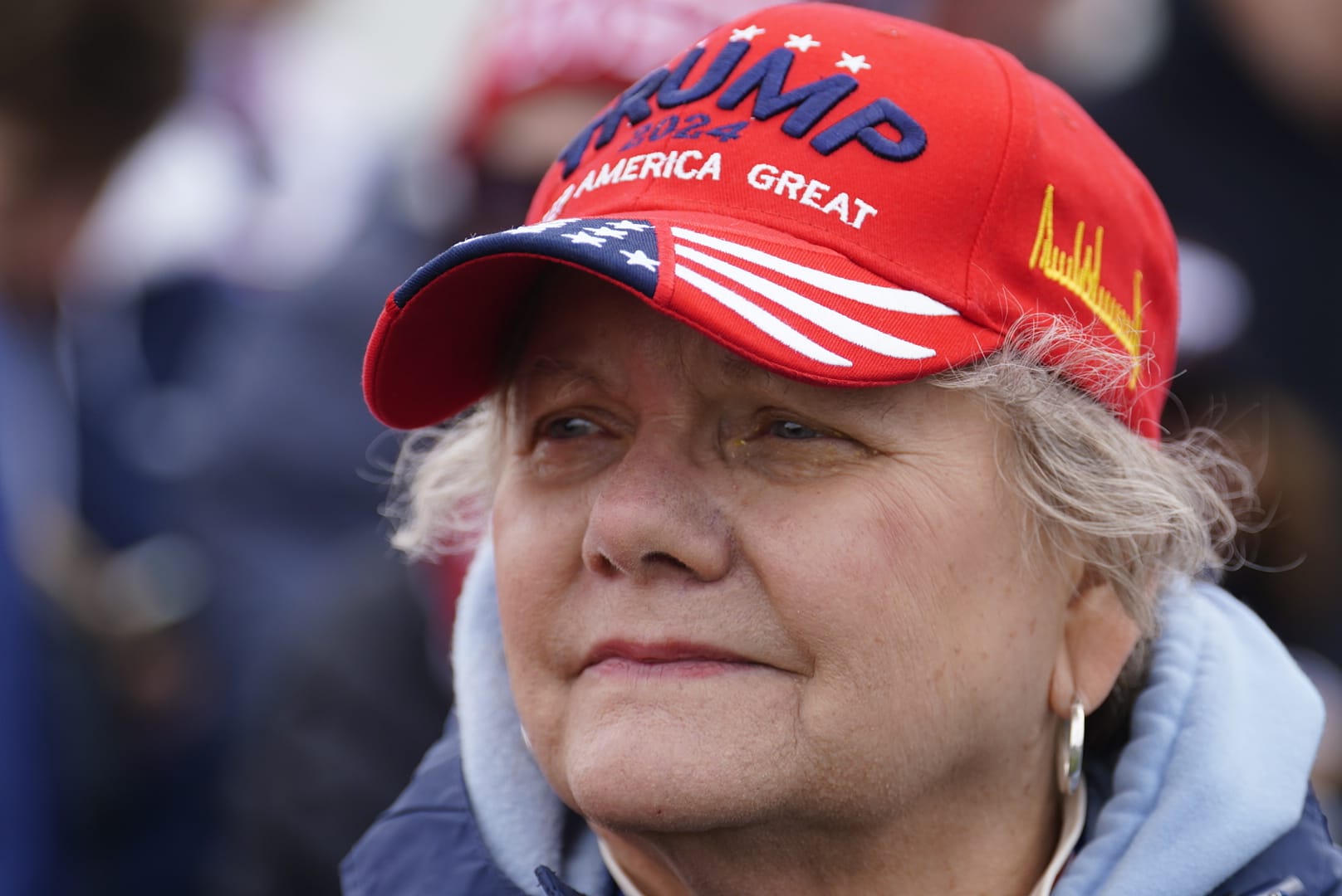 People wait for Donald Trump prior to a rally in Schnecksville on Saturday, April 13, 2024.