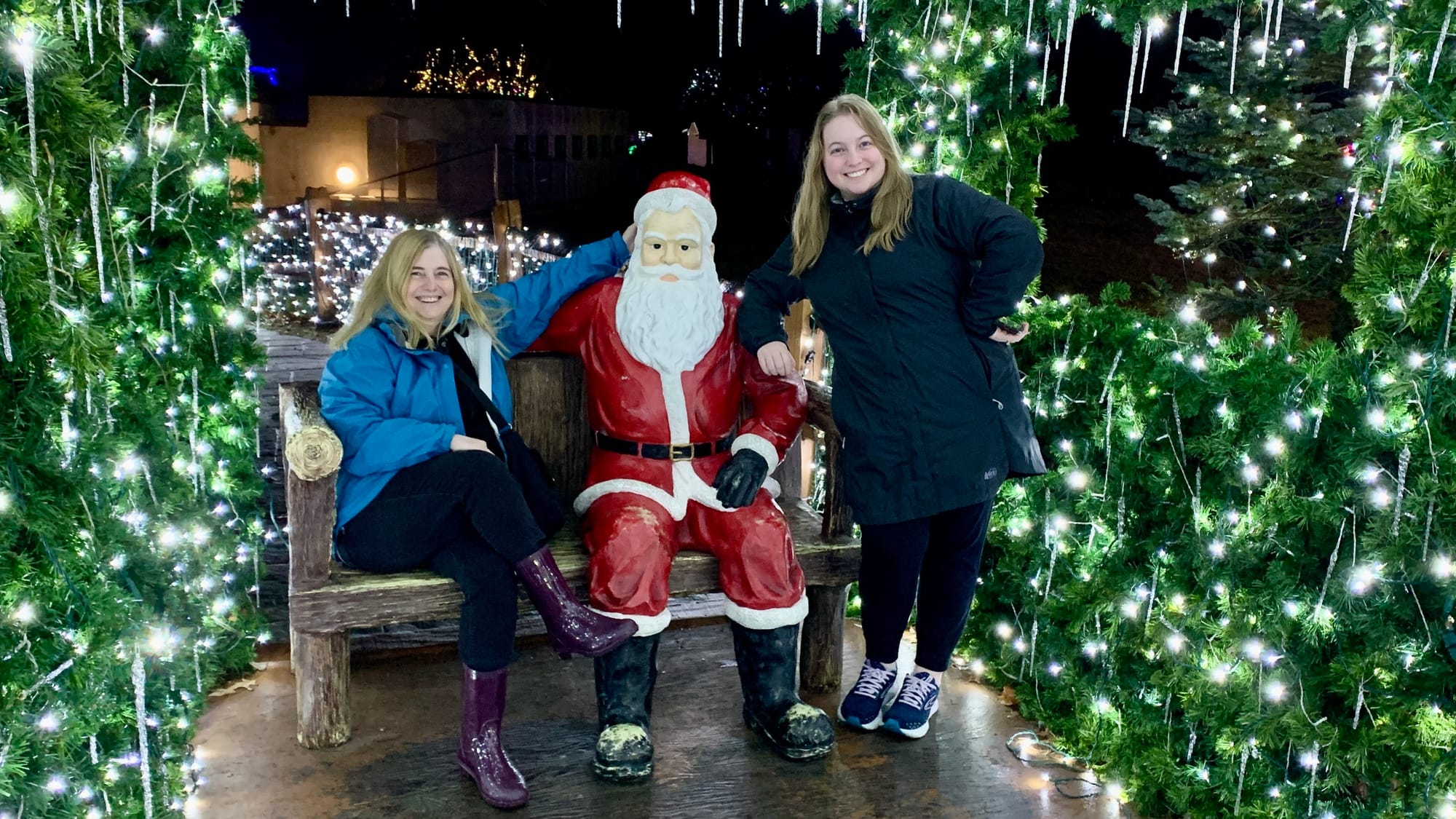 Diane and Jordan Randall pose with Santa at the Winter Light Spectacular.