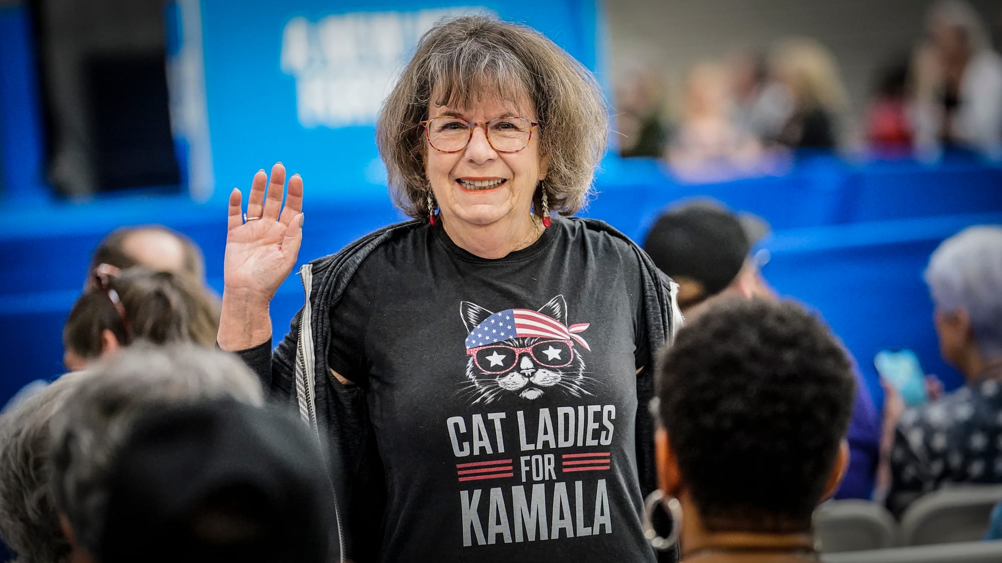 Marti Woglom of Bethlehem awaits Tim Walz. Minnesota Gov. Tim Walz campaigns at Freedom High School in Bethlehem, Pa. on Satu