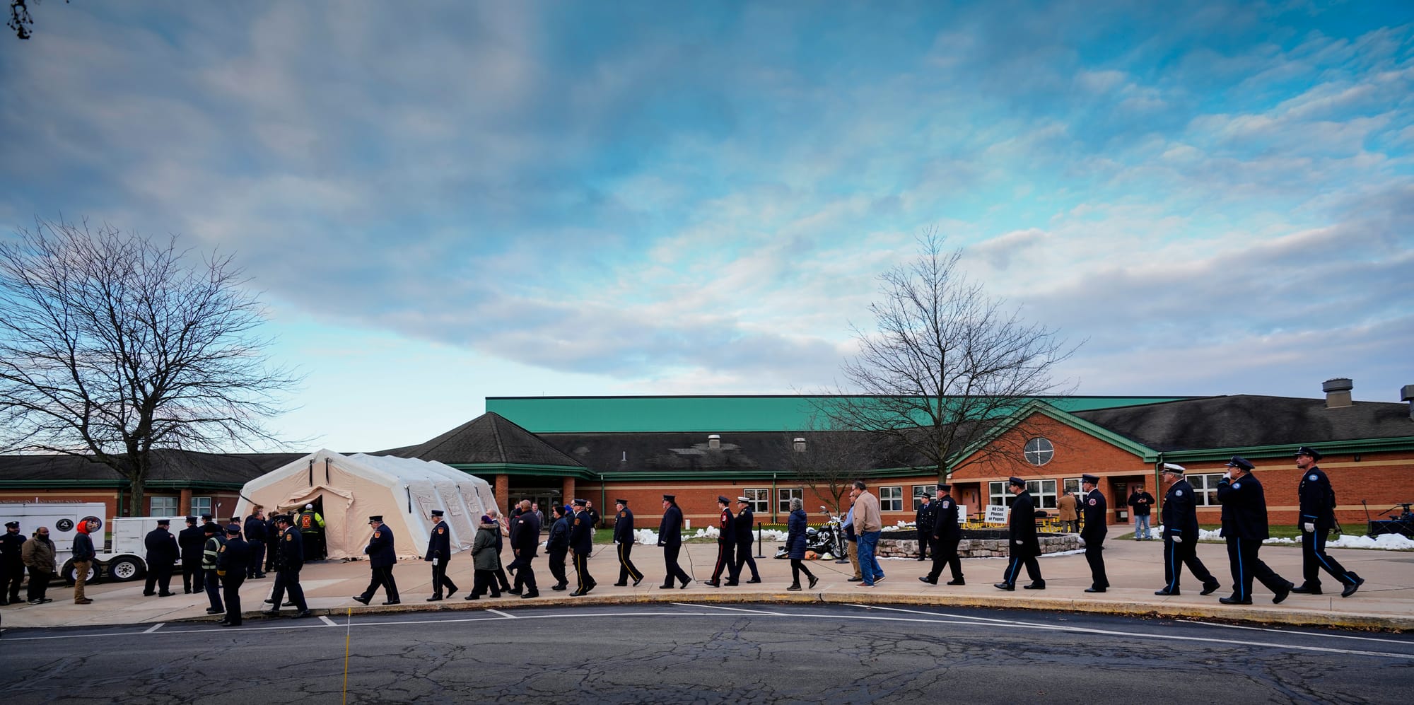 Mourners gather at Northwestern Lehigh Middle School in New Tripoli, Lehigh County, on Saturday, December 17, 2022, to pay tr