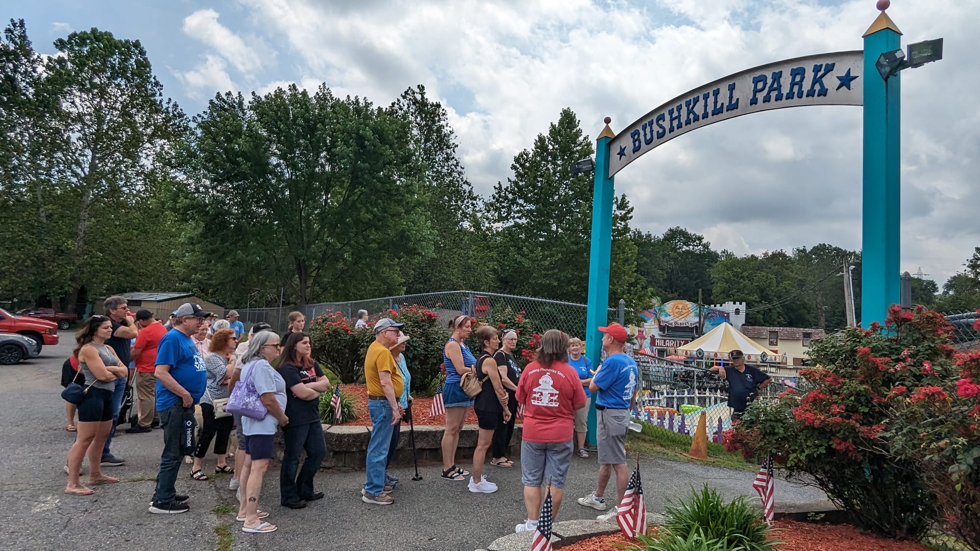 Dozens of people line up to get into Bushkill Park Sunday afternoon, when the park's new carousel is set to be unveiled for t