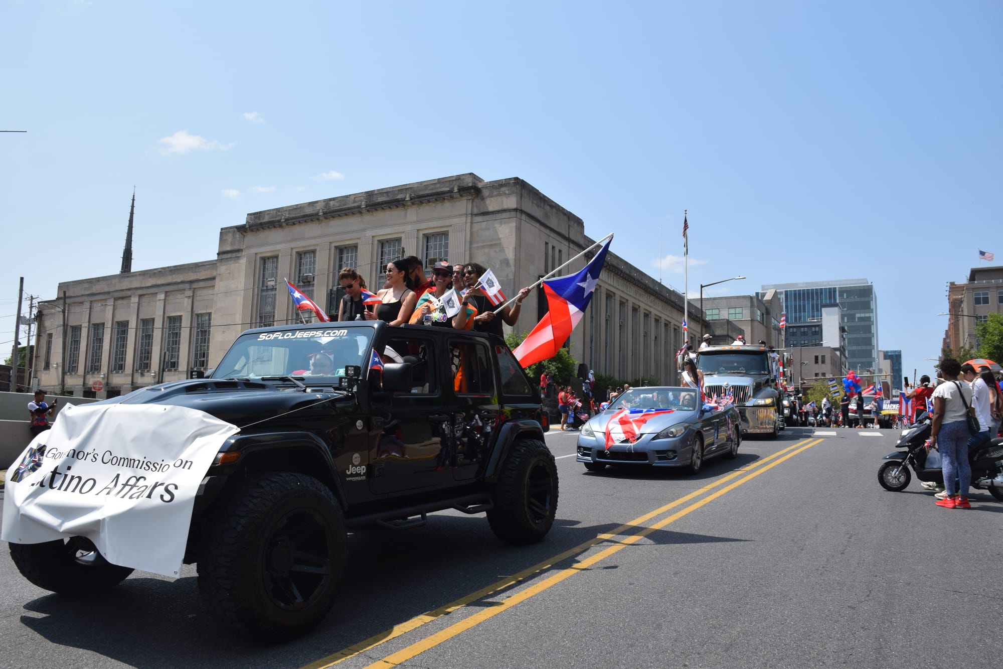 Some of the commissioners from the Governor's Advisory Commission on Latino Affairs took part in the Puerto Rican parade in A