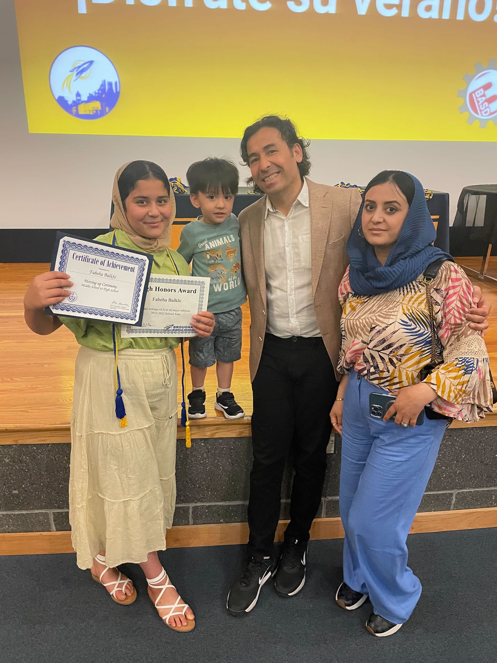 Rohullah Balkhi's daughter graduates from 8th grade.