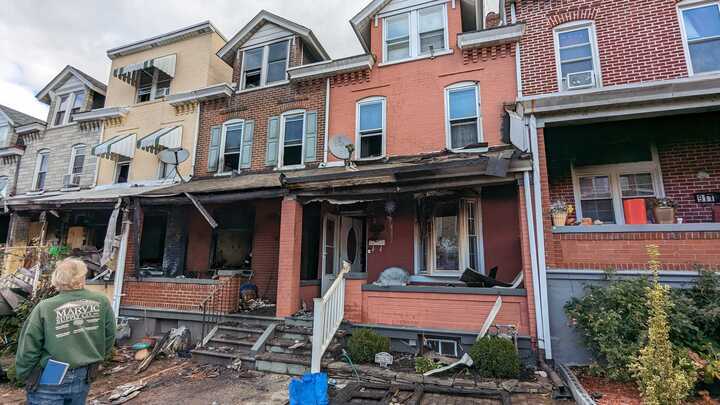 A three-alarm fire fully destroyed one home and extended to at least seven others in the city’s Jordan Heights neighborhood e