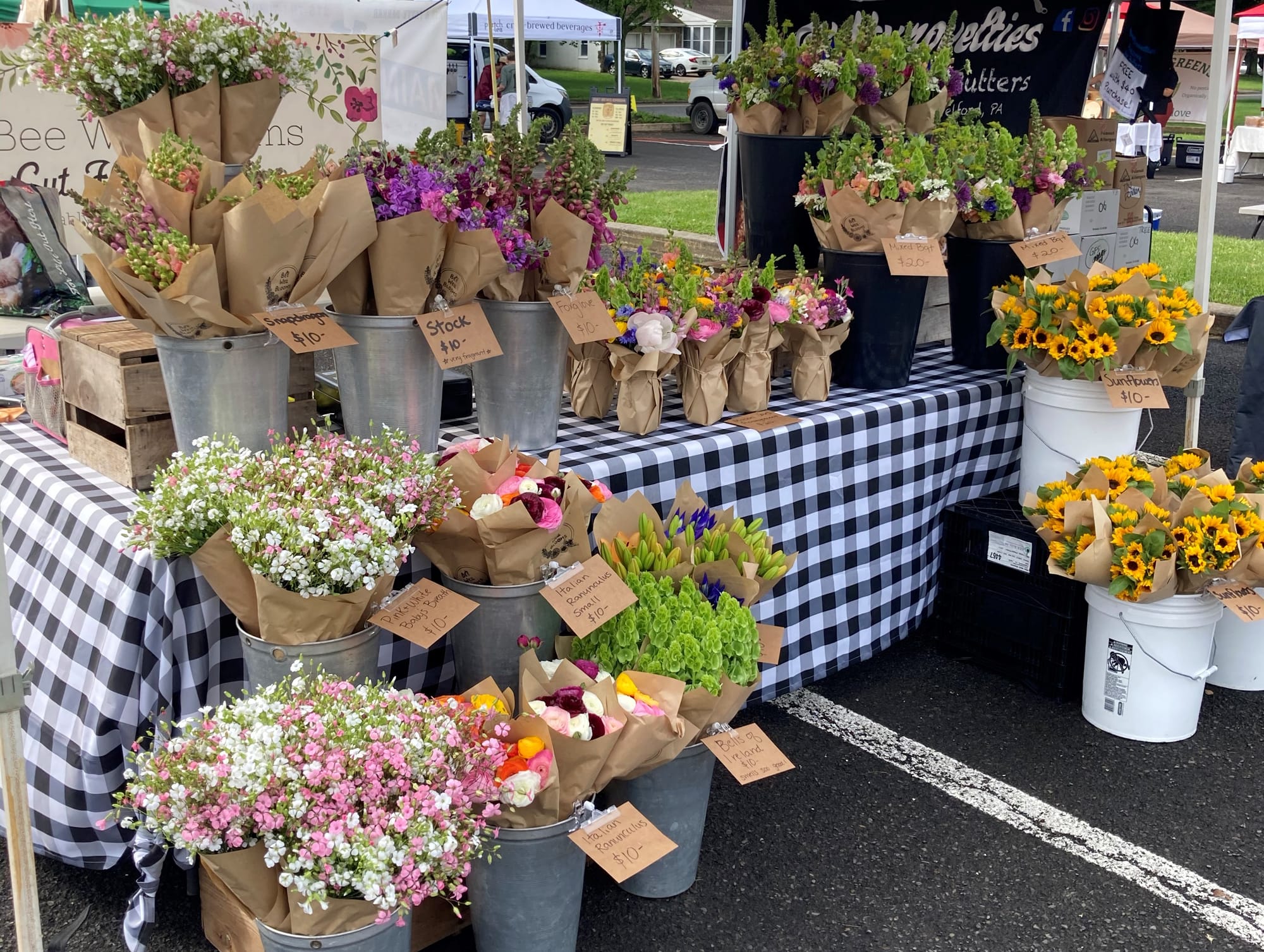 Bee Well Blooms bouquets at a farmers market