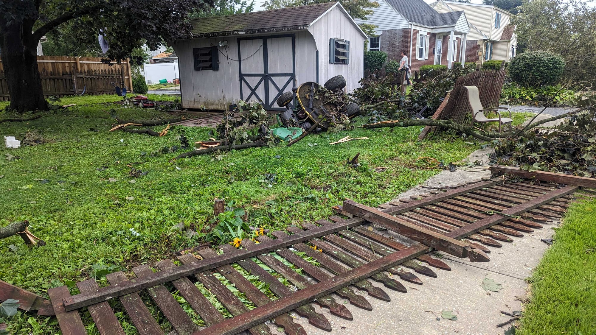 The same house damaged by the storm.