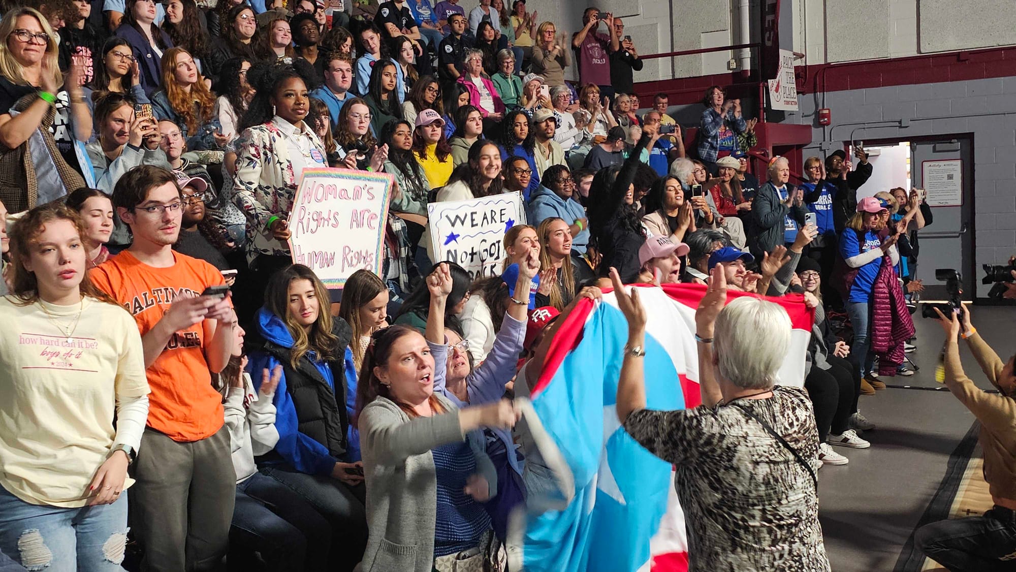 A crowd cheers as U.S. Rep. Susan Wild speaks at Muhlenberg College ahead of Vice President Kamala Harris' visit to Allentown