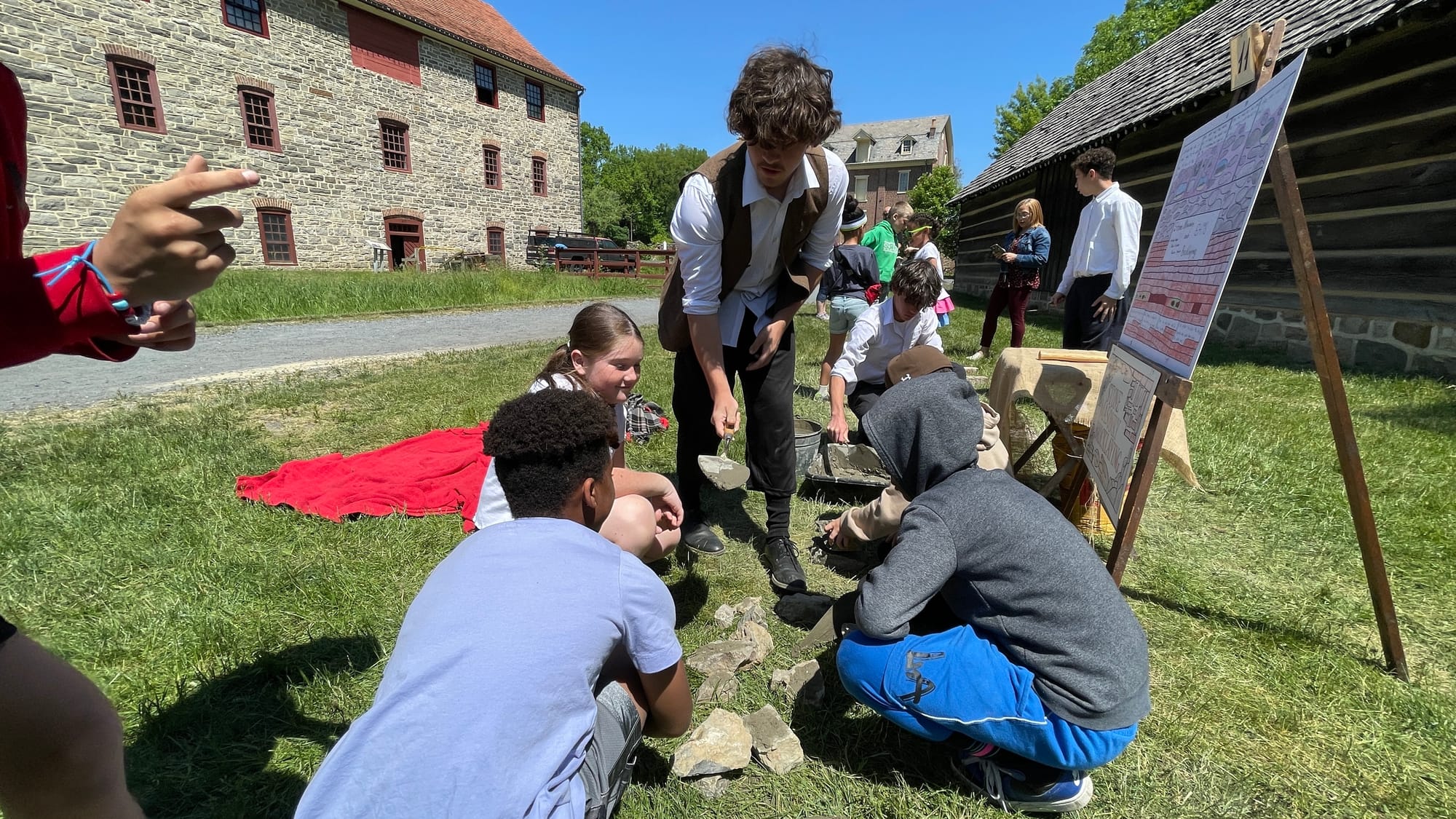 Students discussed bricklaying, with the younger ones also taking part.