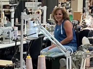 Ghanda Nimeh is a sample maker at Cupid Intimates design center in Bethlehem, sewing pattern pieces together for the new line