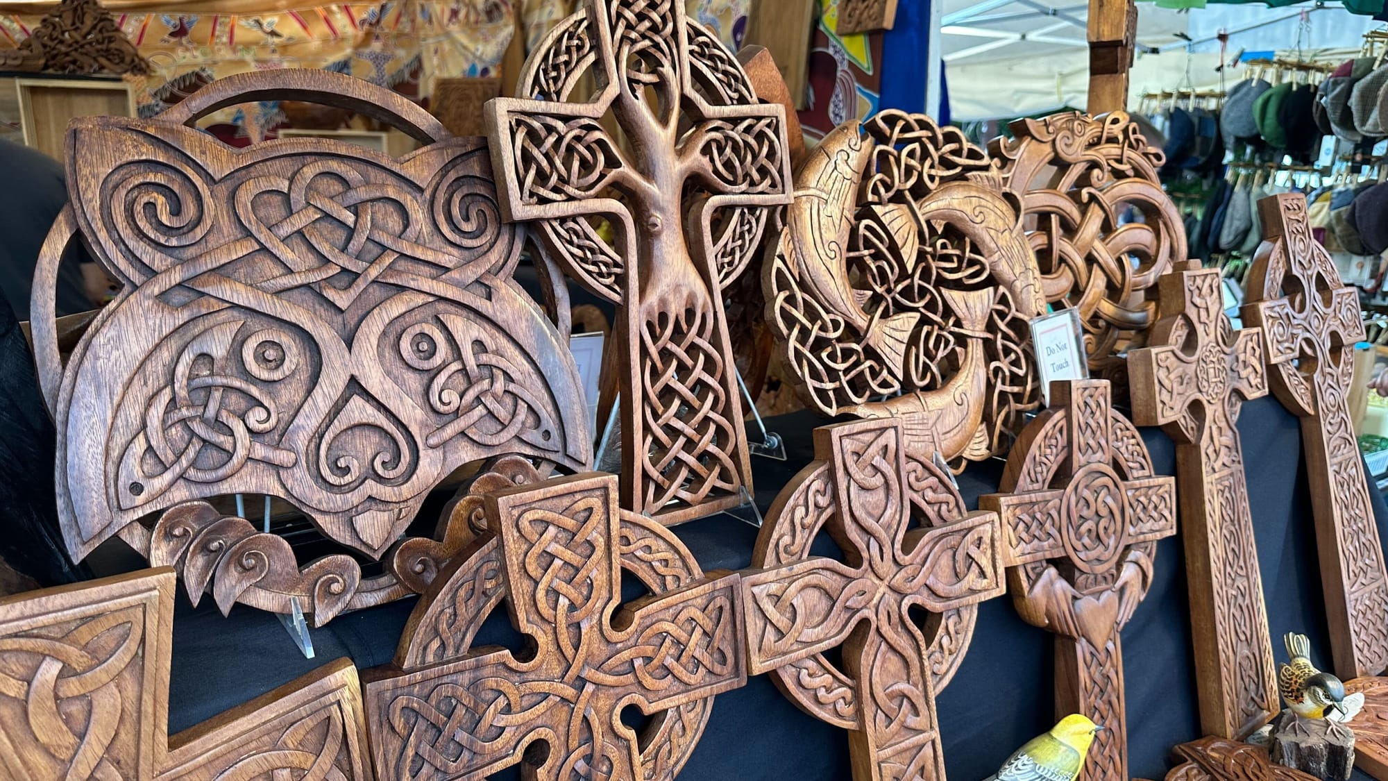 A spread of wood carving works available at Blue Frogs Company at the 37th showing of Celtic Classic in Bethlehem.