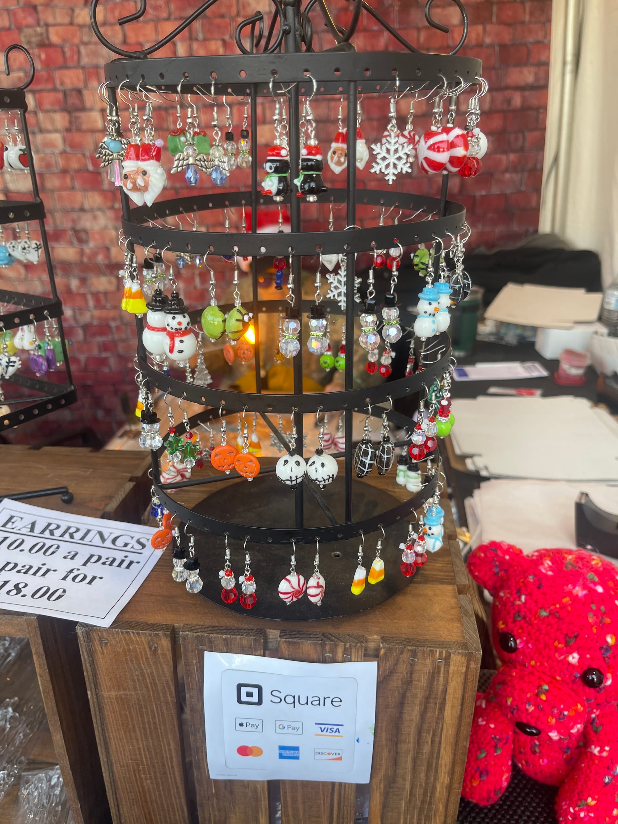 Longtime vendors, the Kellers Glass Blowing company, sells handmade glass blown ornaments, figurines and earrings.