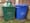 two Bethlehem recycling bins, one green and full of packaging to recycle and one blue with the lid on.