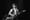 American rock singer-songwriter Lou Reed performs at the Hammersmith Odeon in London in 1975. He is playing a transparent, pl