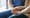 Cropped shot of a senior woman holding hands with a nurse