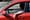 In this file photo, a driver uses his cell phone while driving in Portland, Maine. A bill to ban the use of handheld cellular devices while driving in the state took effect in 2019...