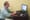 English professor Neal Phillips sits at a Valencia campus computer in Orlando, Fla., crafting an email blast to students who've been flagged by a new program that analyzes how they...