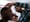 Talib Abdul Mujib, owner of barber shop 1617, shapes up a customer's hair line in the North Philadelphia neighborhood of Philadelphia on Friday, October 21, 2022. 