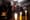 Worshipers pray during an Orthodox Christmas mass in a basement shelter in Chasiv Yar, eastern Ukraine, on Jan. 7. As artillery boomed outside and fighter jets flew overhead, Ortho...