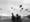 The second wave of combat helicopters of the 1st Air Cavalry Division fly over an RTO and his commander on an isolated landing zone during Operation Pershing, a search and destroy...